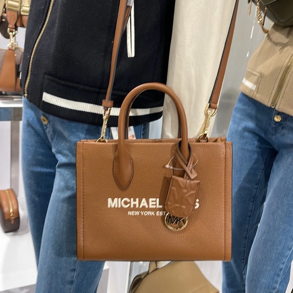 MICHAEL KORS Mirella Sm Shopper TZ XBody Pebbled Leather Crossbody
Luggage
NWT - Picture 11 of 16